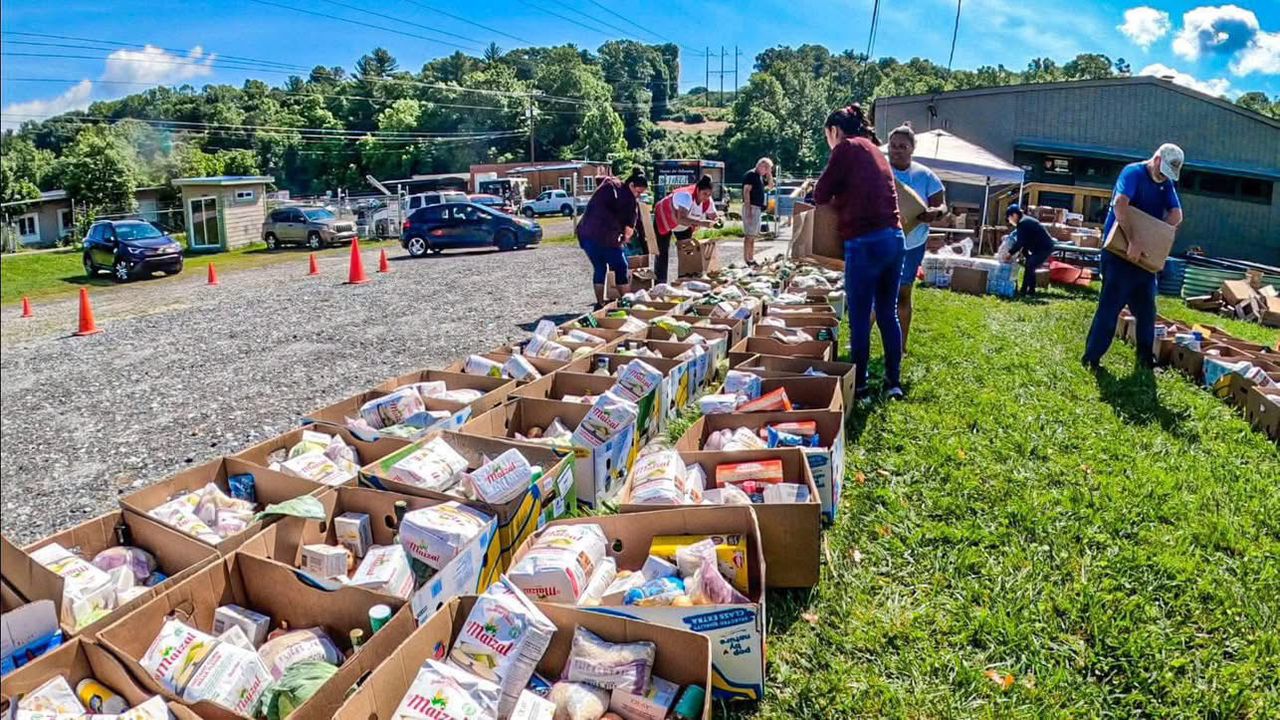 Assortment of free food, meat, and groceries